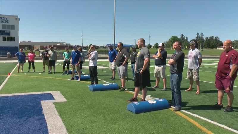 Local Football Coaches Learn How to Keep Athletes Safe on the Field 